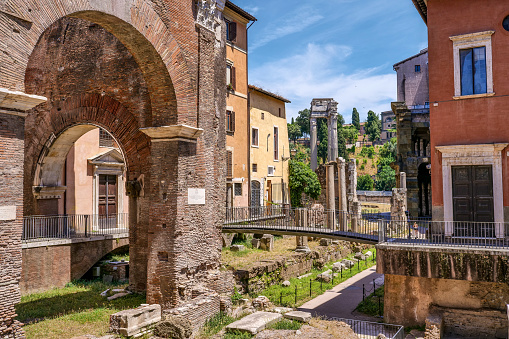 The remains of the Roman temple of the Portico D'Ottavia (left) and the Theater of Marcellus (center), in the Roman Ghetto. The iconic Jewish Quarter of Rome, the oldest ghetto in Europe, is famous for the presence of hidden alleys and small squares, where it is easy to find small restaurants of Italian and Jewish cuisine, and remarkable Roman archaeological remains. The ghetto of Rome is located in one of the oldest districts of the city between the Campidoglio (Roman Capitol Hill) and the River Tiber. In 1980 the historic center of Rome was declared a World Heritage Site by Unesco. Image in high definition format.