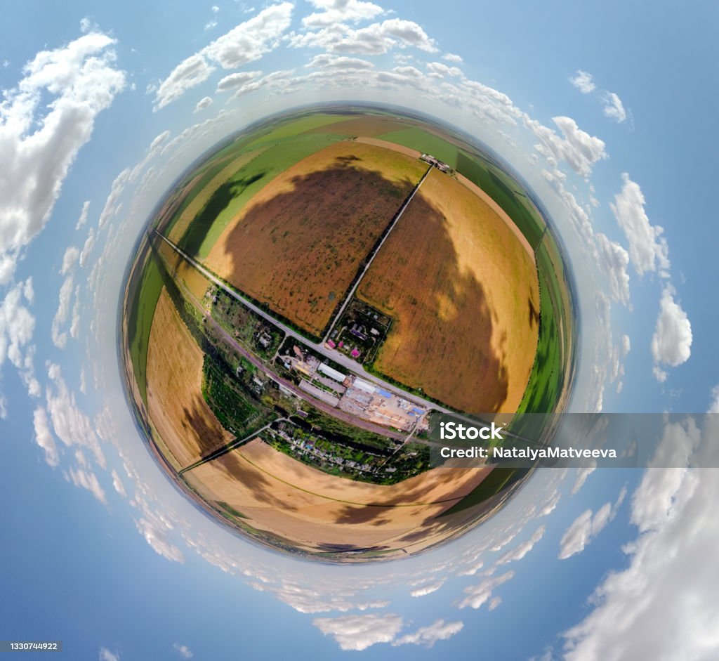 Small planet aerial view of granaries and wheat, corn fields in Moldova, spherical panorama on DJi Mavic Mini 2 Above Stock Photo