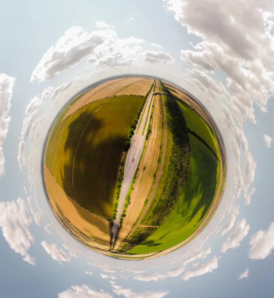 istock Small planet with a view of a bridge and wheatfields under the blue sky in Moldova, spherical panorama on DJi Mavic Mini 2 1330744959