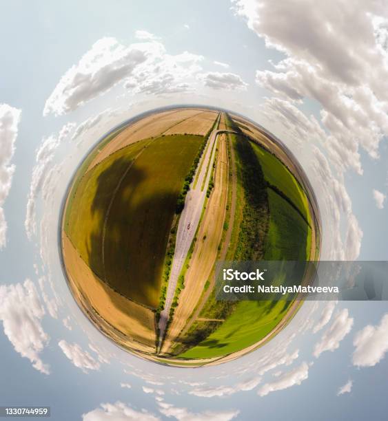 Small Planet With A View Of A Bridge And Wheatfields Under The Blue Sky In Moldova Spherical Panorama On Dji Mavic Mini 2 Stock Photo - Download Image Now