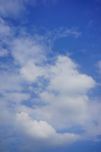 istock Background of cloudy blue sky 1330745130