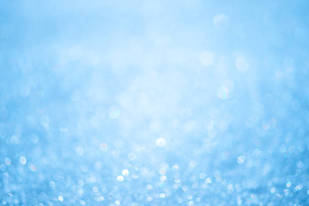 istock Light blue abstract bokeh background in a white luminous haze 1330745138