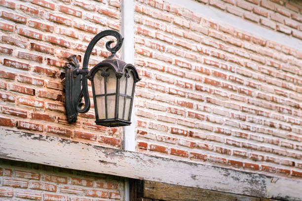 Exterior lights mounted on a brick exterior wall, Europe