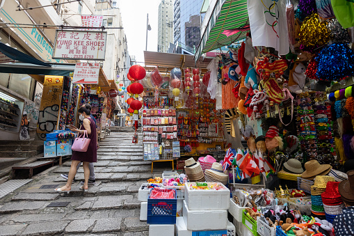 Hong Kong - July 26, 2021 : Street market in Pottinger Street, Central, Hong Kong. Pottinger Street, also known as Stone Slabs Street, was named in 1858 after the first governor of Hong Kong, Henry Pottinger, who served from 1843 to 1844.