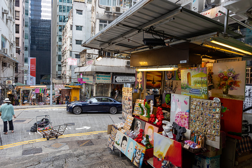 Hong Kong - July 26, 2021 : Street market in Pottinger Street, Central, Hong Kong. Pottinger Street, also known as Stone Slabs Street, was named in 1858 after the first governor of Hong Kong, Henry Pottinger, who served from 1843 to 1844.