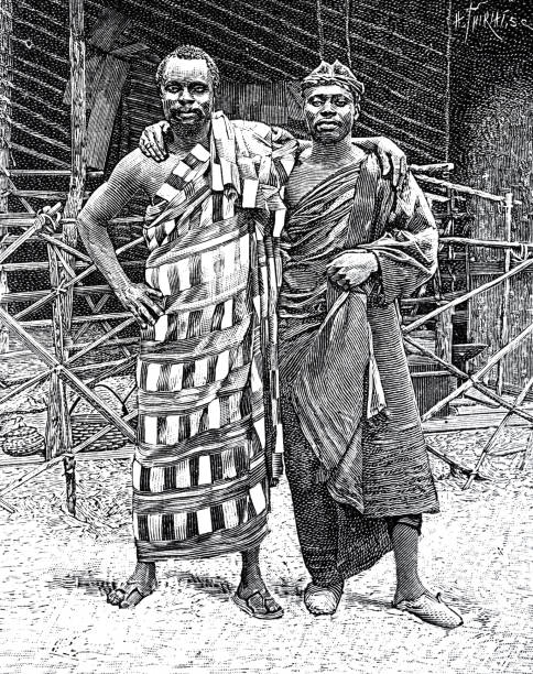 istock Two guinea men on the Exposition universelle 1889, Paris, standing full length,  embracing each other 1330757139