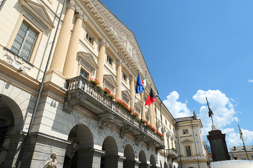 Aosta. Italy. July. 19. 2021. Tourist city center with buildings of traditional Italian architecture.