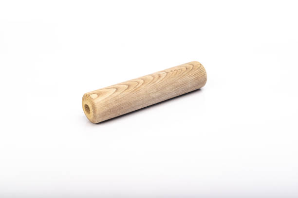 istock wooden rolling pin on white background 1330761357