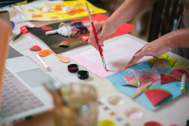 istock Asian chinese female teacher teaching online art class at home 1330763531