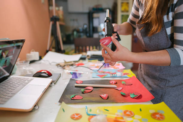 istock Asian chinese female teacher teaching online art class at home 1330763555