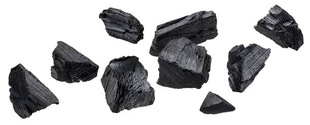 istock Natural wood charcoal isolated on white background 1330764930