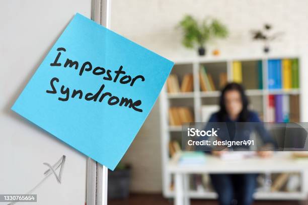 Impostor Syndrome Written On The Sticker On The Whiteboard Stock Photo - Download Image Now