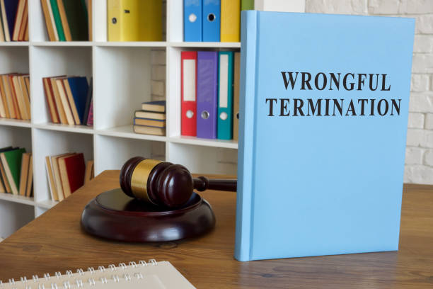 istock Rules about wrongful termination and employment on the desk. 1330765674