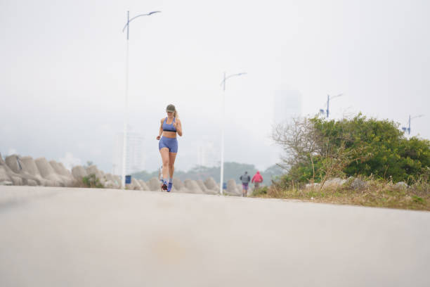 istock Running woman in fresh morning 1330768367