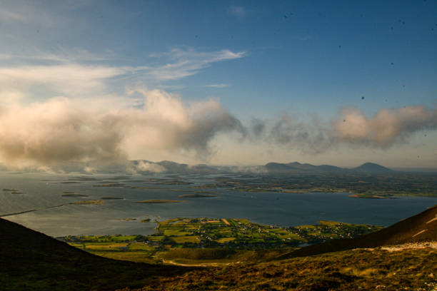 Clew Bay from Croagh Patrick View of Clew Bay from about halfway up Croagh Patrick, a popular pilgrimage site in the west of Ireland due to the country's patron saint, Patrick, spending 40 days and nights on the mountain over 1,500 years ago clew bay stock pictures, royalty-free photos & images