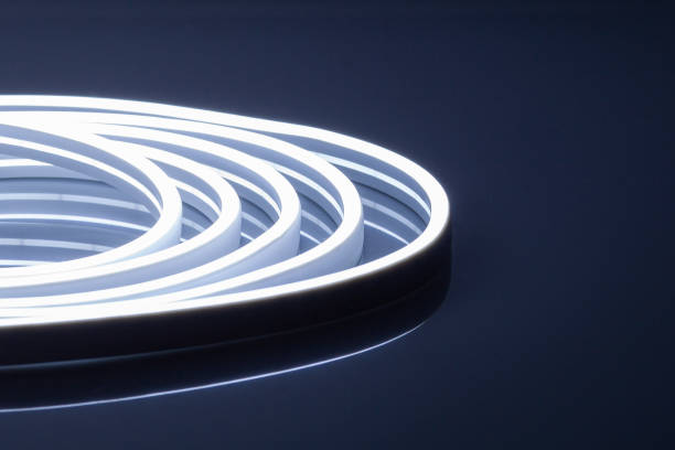 istock Flexible cold white LED neon strip on black background 1330769477