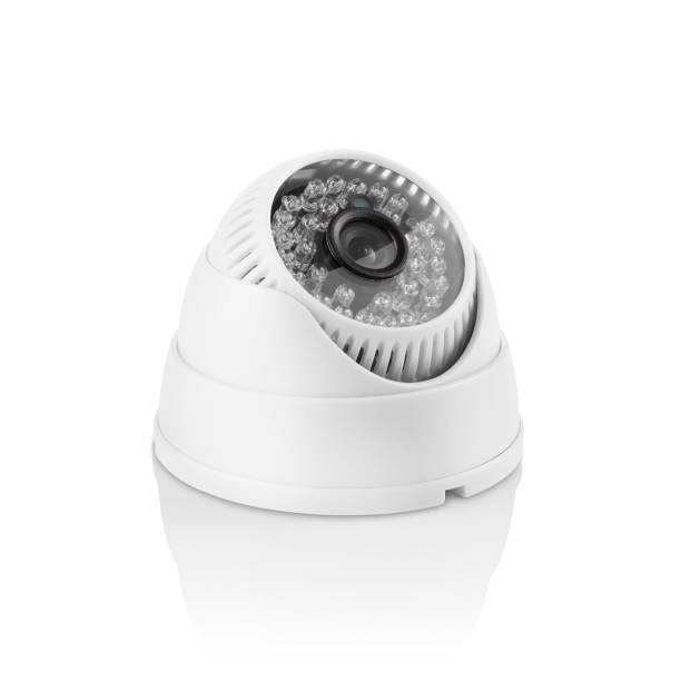 istock Three-quarter view of round white indoor surveilance camera 1330769554