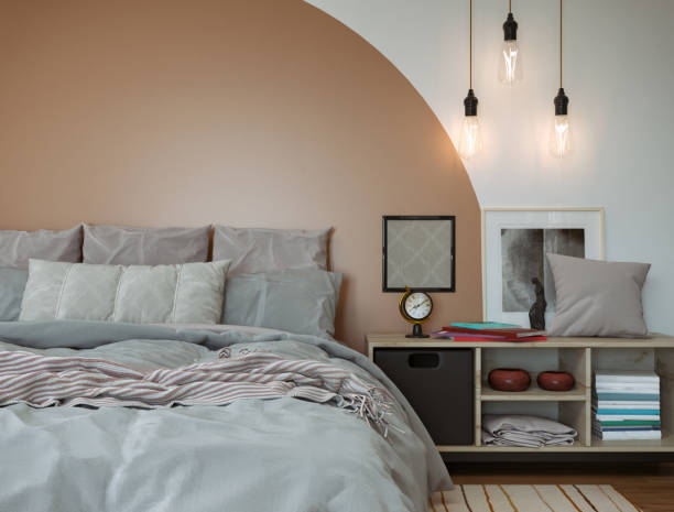 istock Cozy bedroom with painted arch headboard 1330770111