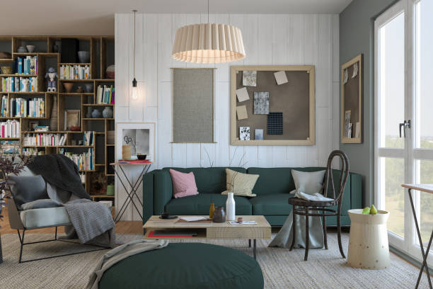 istock Small living room with bookshelf and green sofa 1330772173