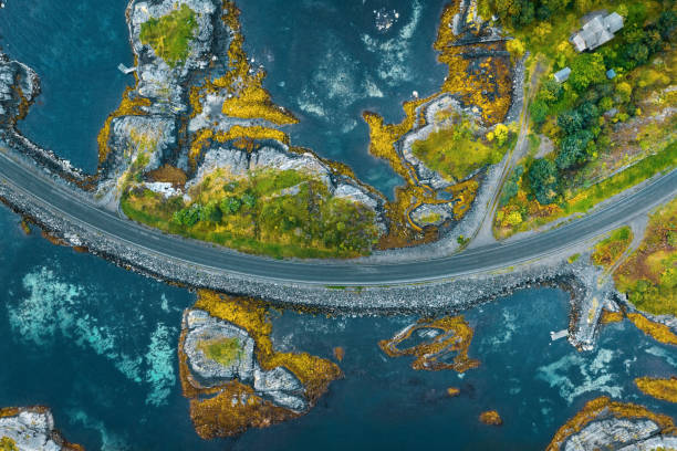 Aerial view Atlantic ocean road in Norway travel roadtrip drone scenery from above beautiful scandinavian landmarks destinations top down stock photo