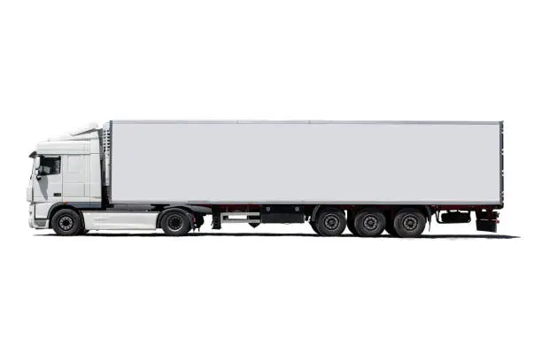 Photo of White semi-truck with trailer isolated on white background