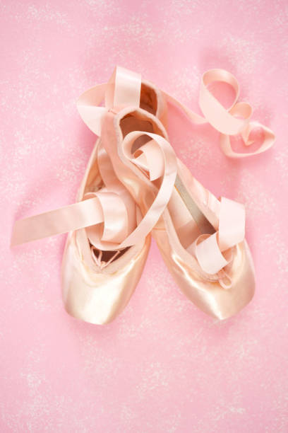 istock Pointe Ballet Shoes Aesthetic desktop workspace blog header overhead flat lay. 1330775061