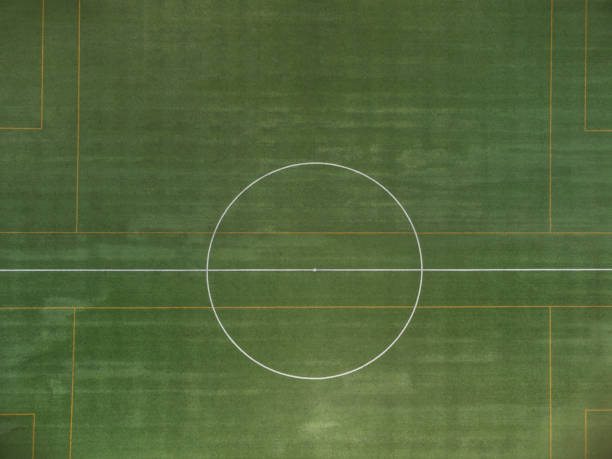 istock Aerial view of an artificial grass soccer field. 1330783110