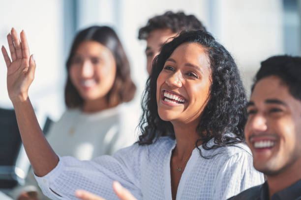 istock Group of people listening to a presentation. 1330785000