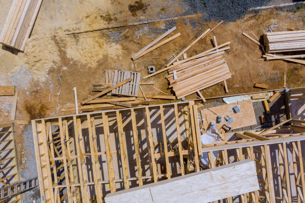 istock Stacked wooden building materials a stack of boards wood frame and beam construction 1330785131