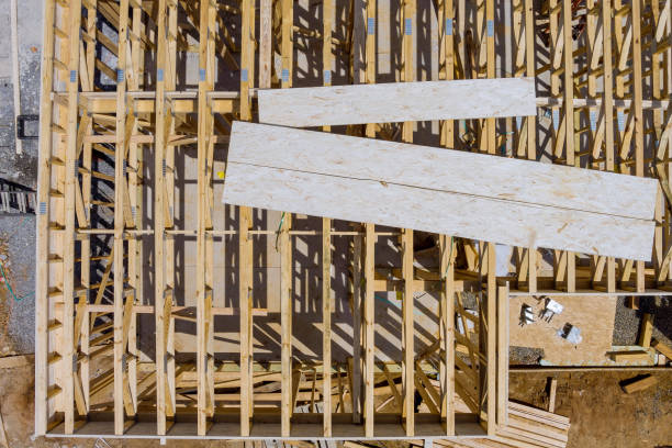 istock Truss, joist, beam new house under construction exterior framing timber framing 1330785139