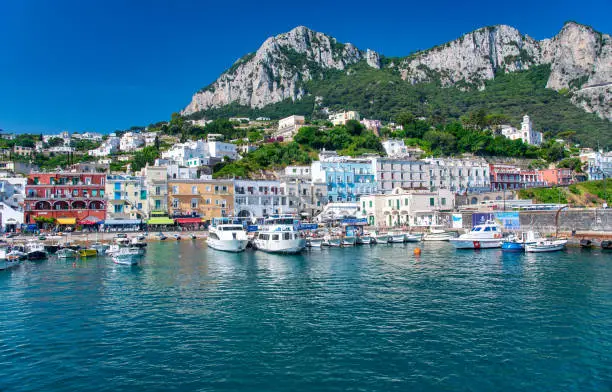 CAPRI, ITALY - JUNE 18, 2021: Famous port of Capri on a sunny beautiful day