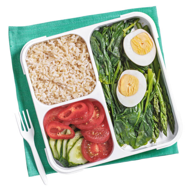 istock Lunch box with food isolated on white 1330787675