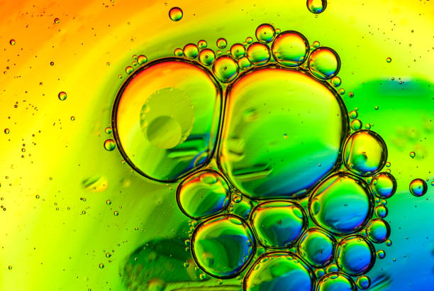 istock bubbles created by mixed water and oil over a colored background 1330794186