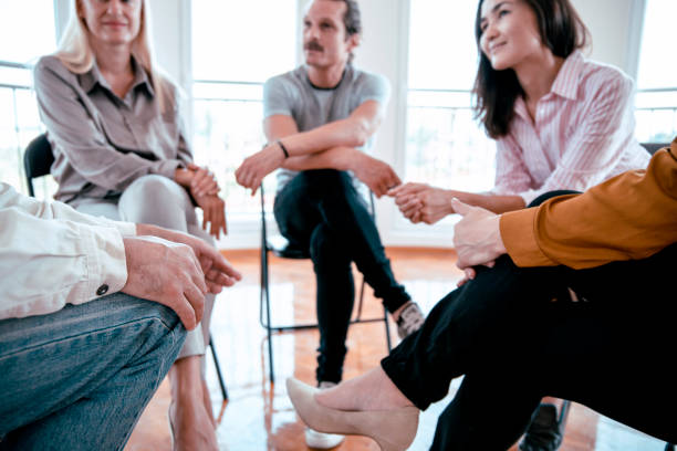 istock Male hands in blurred people on psycho therapy session 1330799202