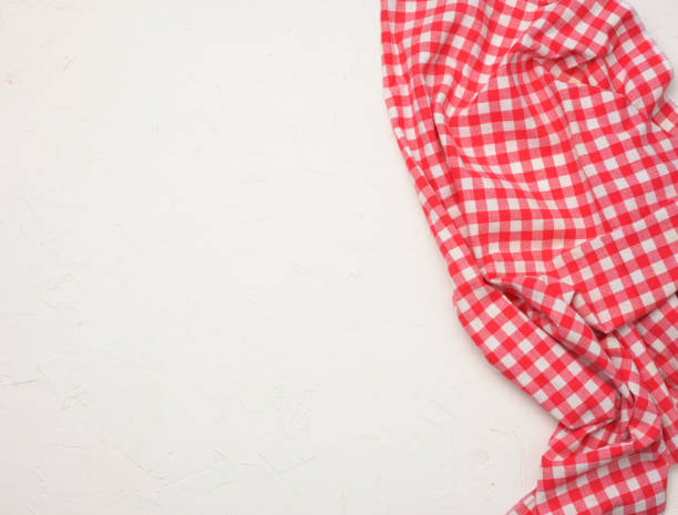 istock folded cotton red white checkered napkin on a white background 1330799406