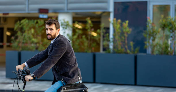 istock A Young Businessman is Going to the Office by his Bicycle 1330802125