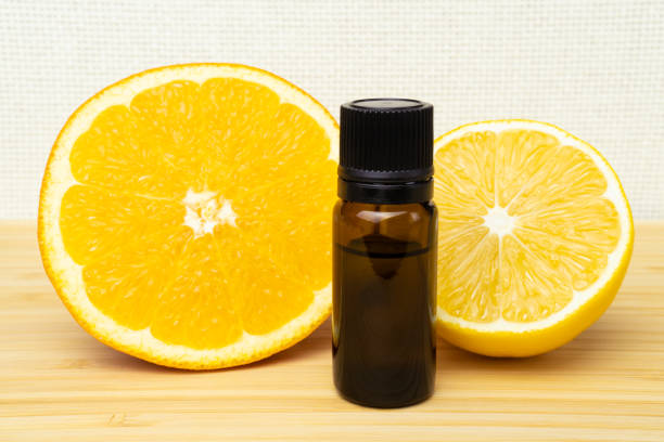 istock Bottle with ciitrus essential oil on bamboo table. 1330804002