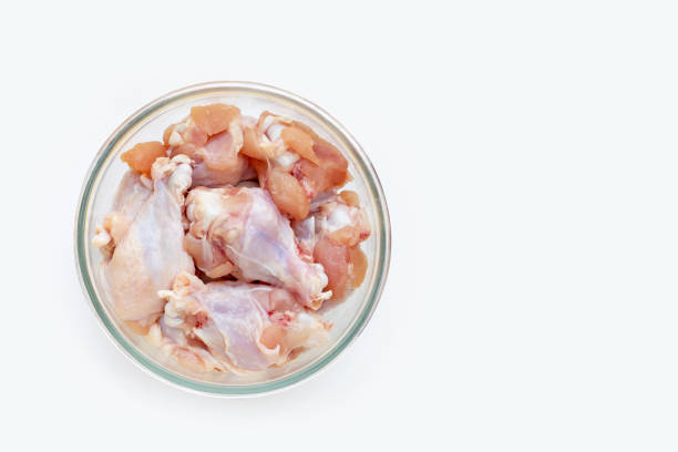 istock Fresh raw chicken wings (wingstick) in glass bowl 1330805265