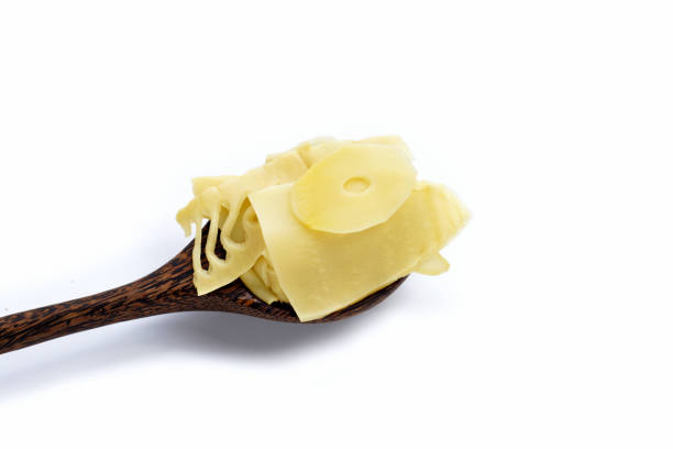 istock Preserved bamboo shoot slices on white background 1330805850
