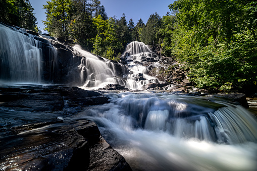 Three tiers of waterfalls shot on the gorge floor at Tallulah Gorge State Park in Tallulah Falls, Georgia.