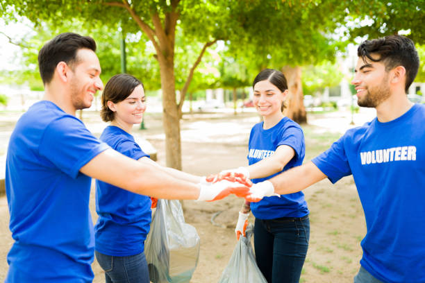 istock Group of people celebrating their community work 1330822750