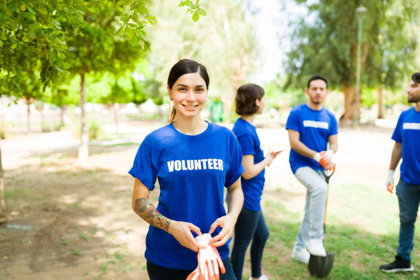 istock Attractive volunteer reforesting the park 1330823377