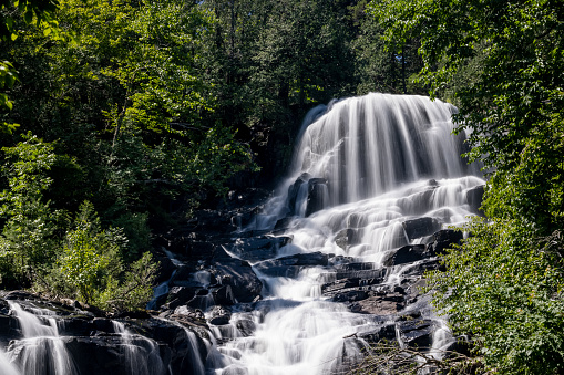 Chutes Waber Waterfalls in summer located in Parc national de la Mauricie, Quebec, Canada. At 27 metres in height, the falls have a water flow that varies with the seasons, offering spectacular panoramas.