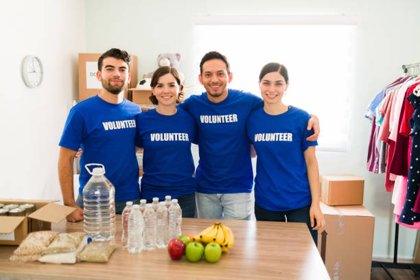istock Diverse young people working as volunteers 1330831032