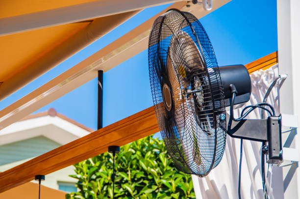 istock metal electric fan outside for cooling 1330832805
