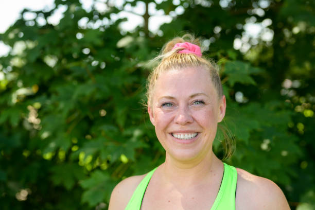 istock Happy vivacious woman with a beaming friendly smile 1330835856