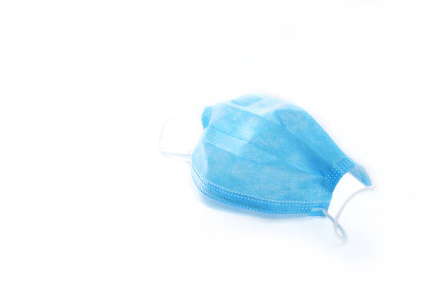 istock Medical protective mask isolated on a white background, copy space for text. 1330836839