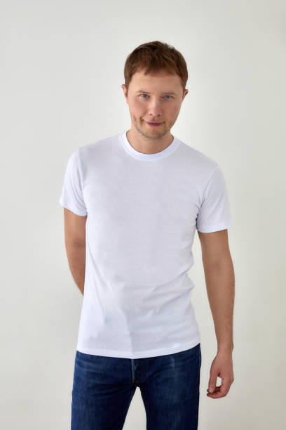istock Positive young man in casual outfit standing on white background 1330838530