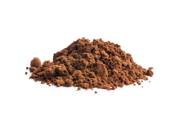 istock Cocoa powder isolated on white background. 1330838855