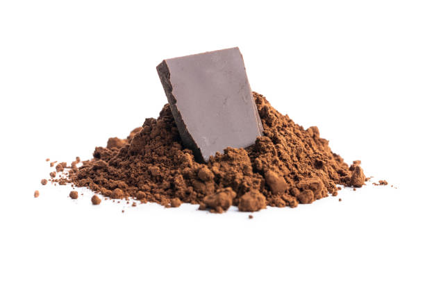 istock Cocoa powder and chocolate isolated on white background. 1330838920